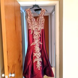 Camille La Vie red dress with intricate gold lace